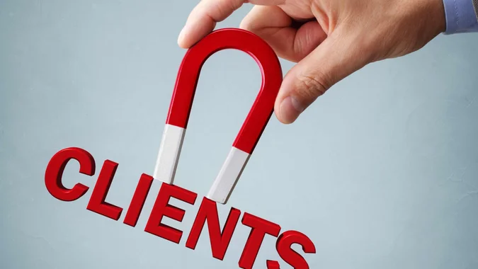 Smiling ProCharted  accountant help a client